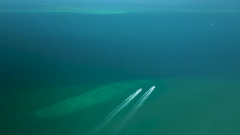 aerial video of the great coral reef of veracruz, the majestic sea crossed by two boats