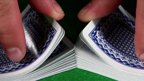 a deck of cards is shuffled in slow motion