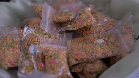 Fennel-Seeds,-Known-as-Saunf-or-Variyali,-Packaged-in-Small-Bags-for-an-Indian-Wedding-Ceremony---Close-Up