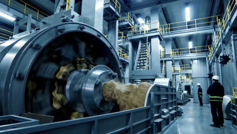 large industrial machinery processing materials in a factory