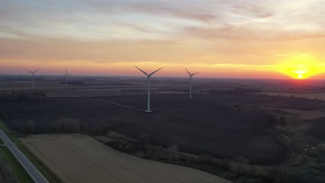 sunset over a wind farm