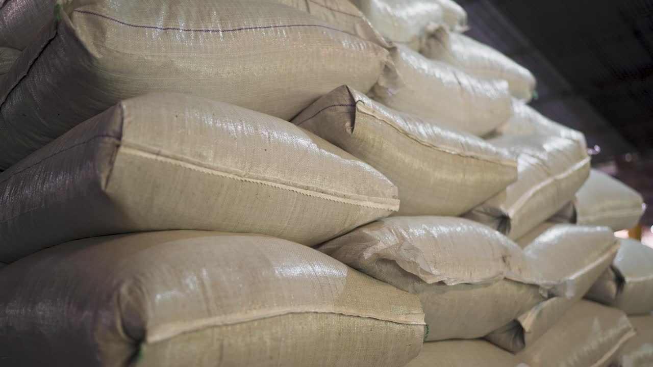 Close-up view of sacks filled with Yerba maté stored in an agricultural warehouse