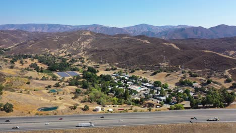 aerial over the 5 freeway highway near gorman and the grapevine, california