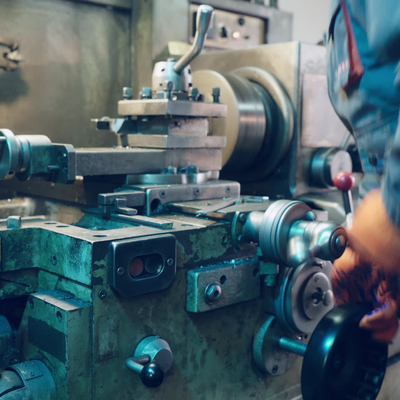 Modern lathe-cutting machine with manual control. Metalworking equipment.