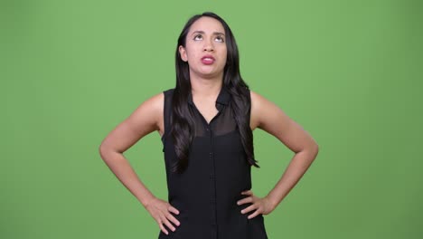 young beautiful asian businesswoman looking bored