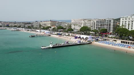 low panning shot cannes waterfront france drone,aerial