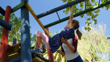 Mother-and-daughter-playing-in-the-playground-4k
