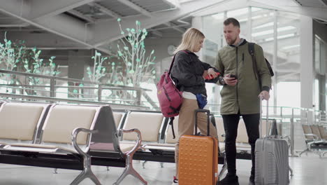 couple waiting at airport