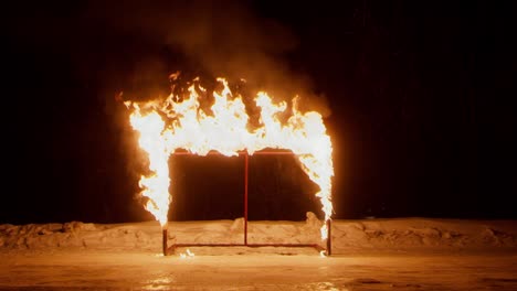 carcass of hokey gate in burning flame on ice arena