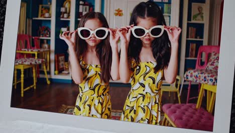 stylish twins in a playful kids room
