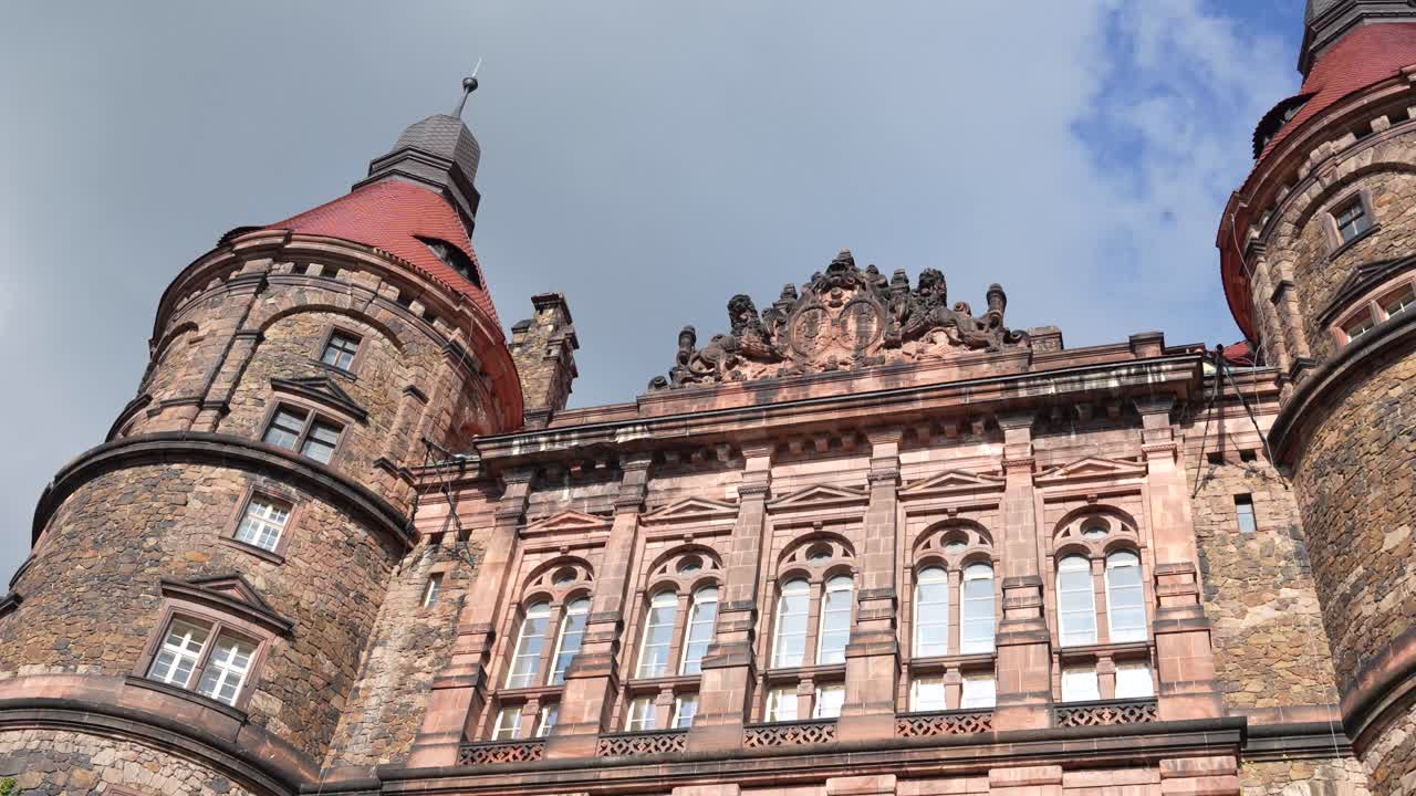 Ksiaz Castle facade and towers with gothic medieval architecture, in Poland