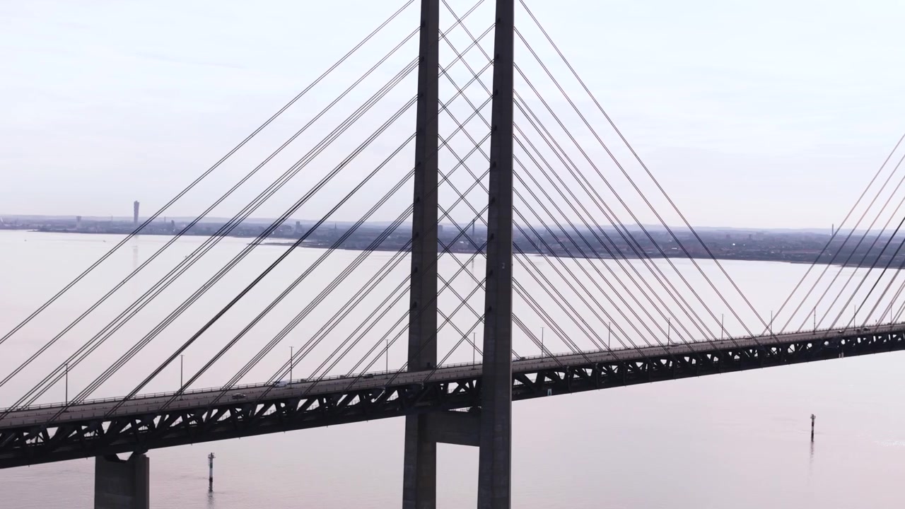 Fly sideways, view of Öresund bridge and Malmö city in the background