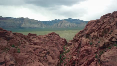 Aerial-Flyover-Revealing-Epic-Red-Rock-Canyon-in-4K