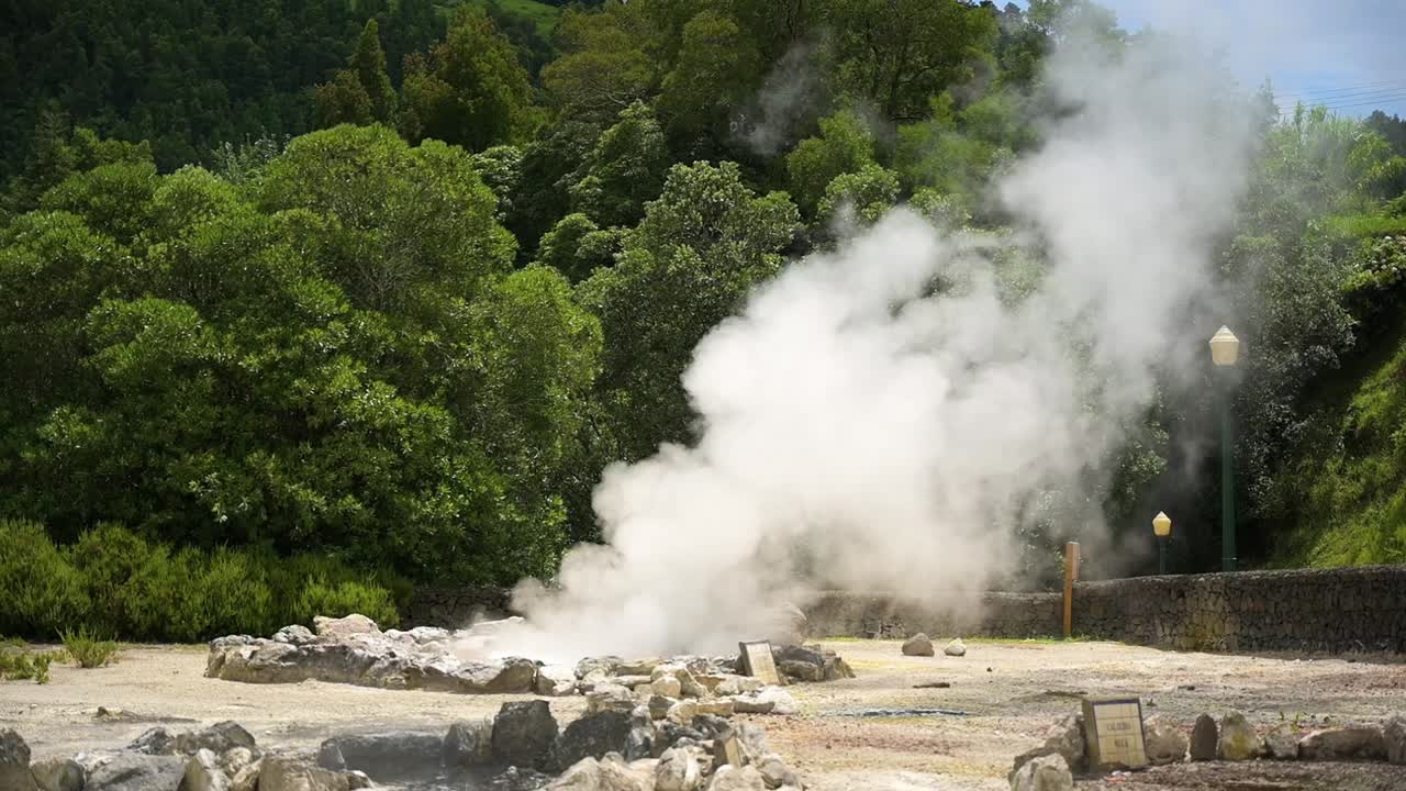 120 fps slow motion clip of an active Geyser, geothermal hot springa at natural landmark &amp;quot;Caldeiras das Furnas&amp;quot; fuming in Furnas, San Miguel Island, Azores, Portugal