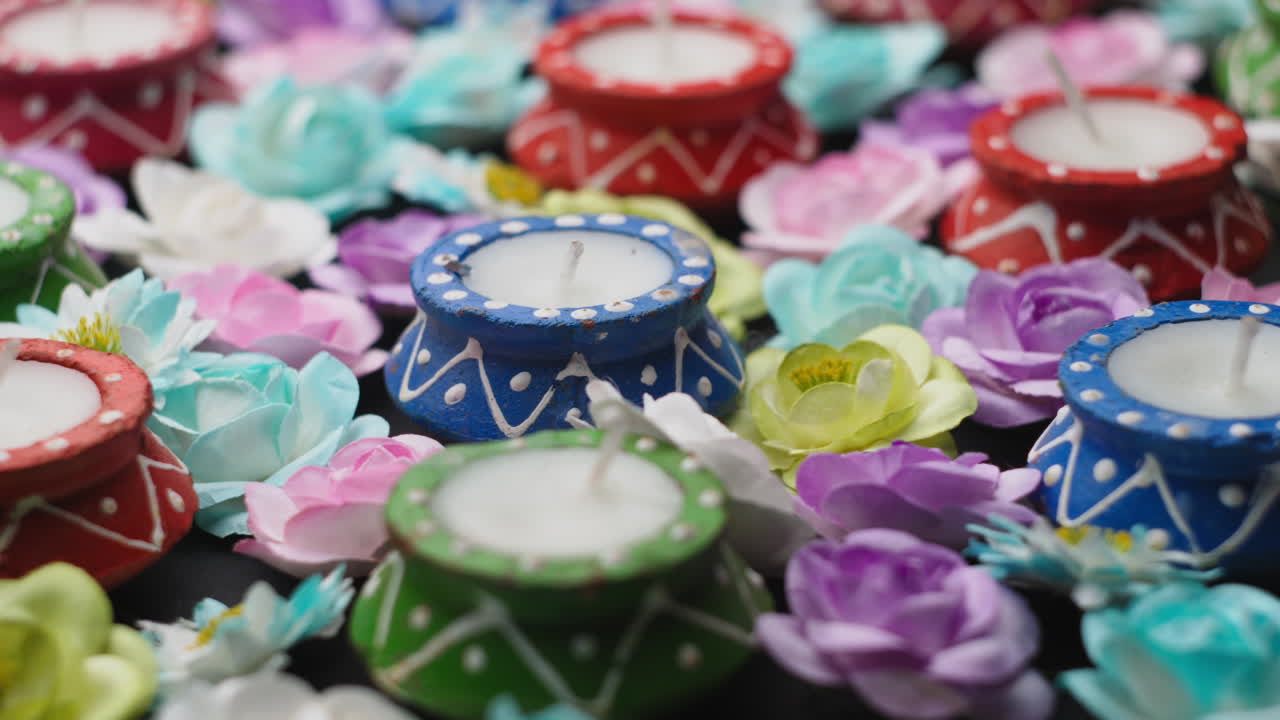 A rotation of candles and flowers for the Indian festival of Diwali