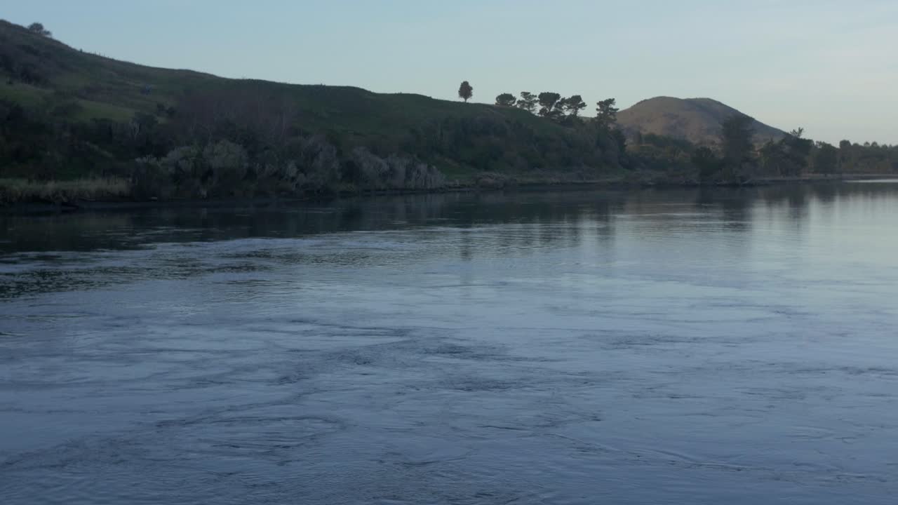 The Beautiful and Peaceful Scenery Of A Blue Calm Sea In Catlins in New Zealand - Wide Shot