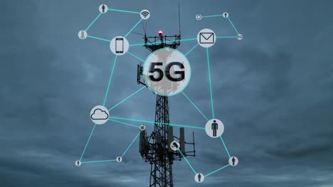 5g communication tower surrounded by digital network icons. blue lines connect various symbols like cloud, phone, and email. aerial view with a dark, cloudy background.