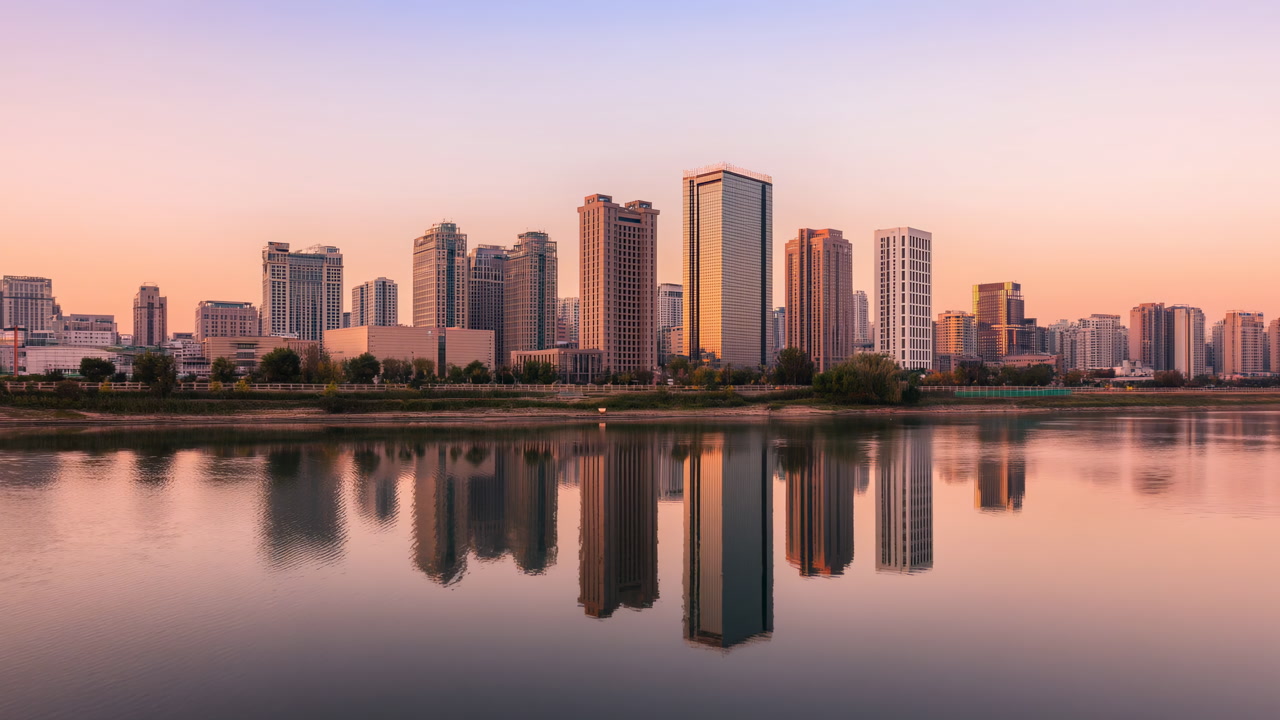 Sunrise Skyline Reflected In Water Soft Pastel Sky Over Corporate Highrise District Mirrored Glass Facades