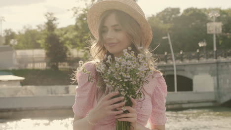 woman with flowers in a park