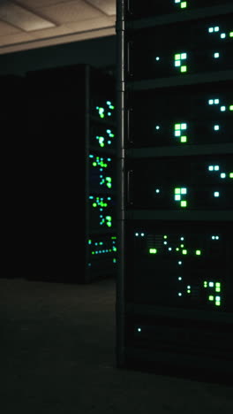 inside a dark server room with glowing lights