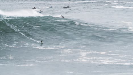 2020-slow-motion-of-a-big-wave-surfer-riding-a-monster-wave-in-Nazaré,-Portugal