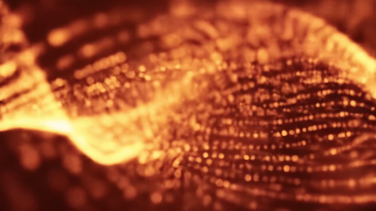 This engaging display features vibrant orange and gold patterns that interact fluidly, creating a mesmerizing visual experience. The intricate textures capture attention and evoke feelings of warmth.