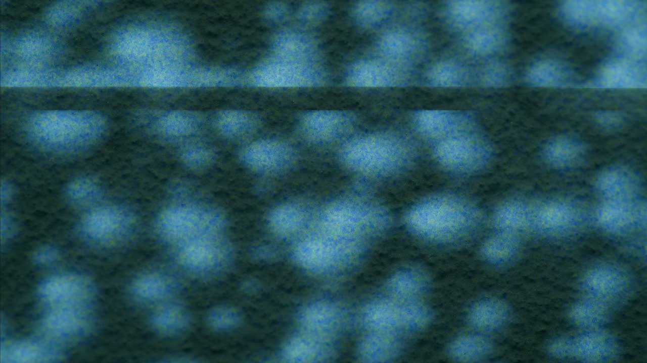 A retro TV displaying static noise, creating a nostalgic vintage atmosphere with blue and green hues.