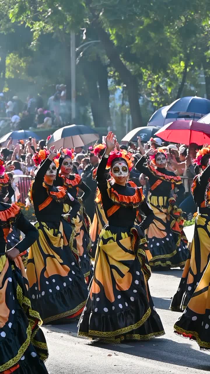 Day of the Dead Parade: Women in Calavera Costumes Dance Through the Streets