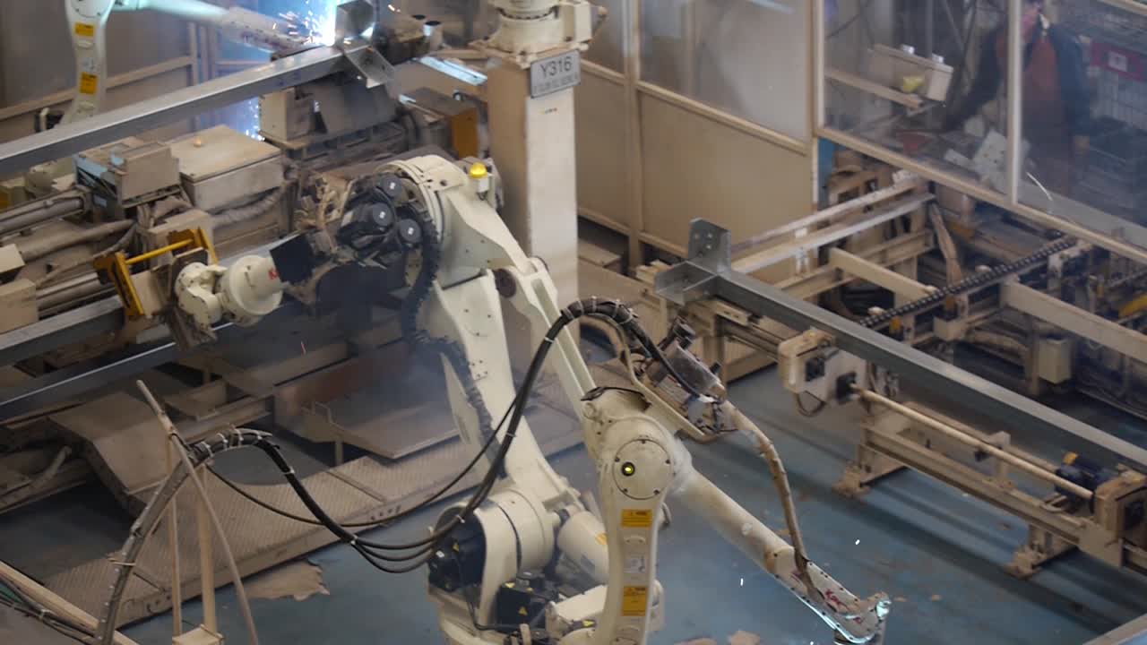 Mechanical Robot Work in Metal Factory