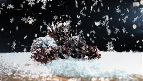 animation of snow falling over pine cones christmas decoration