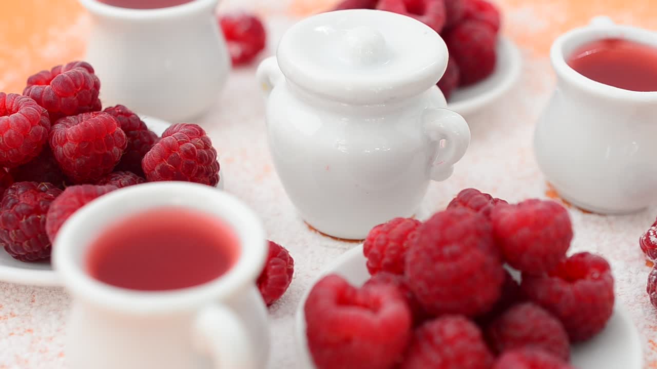 Raspberry and jam, still life. Shooting in the movement
