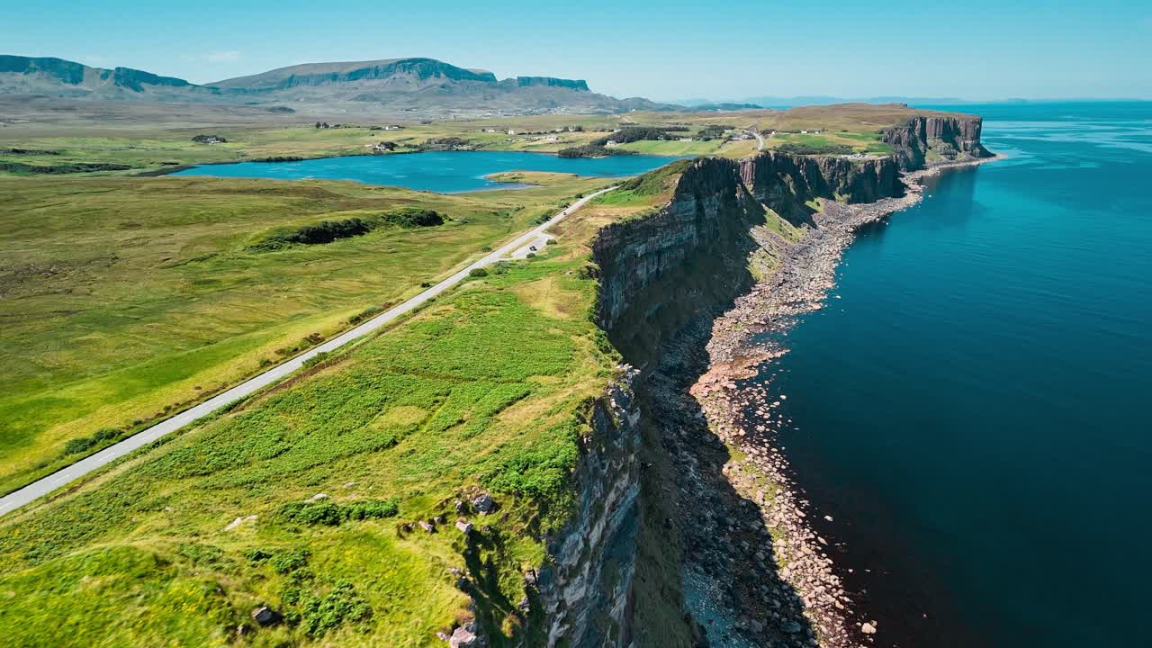 Scenic aerial view of the Isle of Skye, Scotland with cliffs, ocean, and mountains