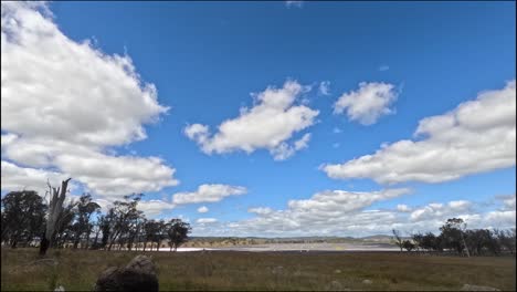 clouds moving swiftly across a rural landscape