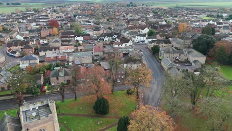 aerial view of a charming english village in autumn