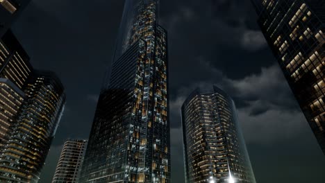 Glass-Skyscrpaer-Office-Buildings-with-dark-sky