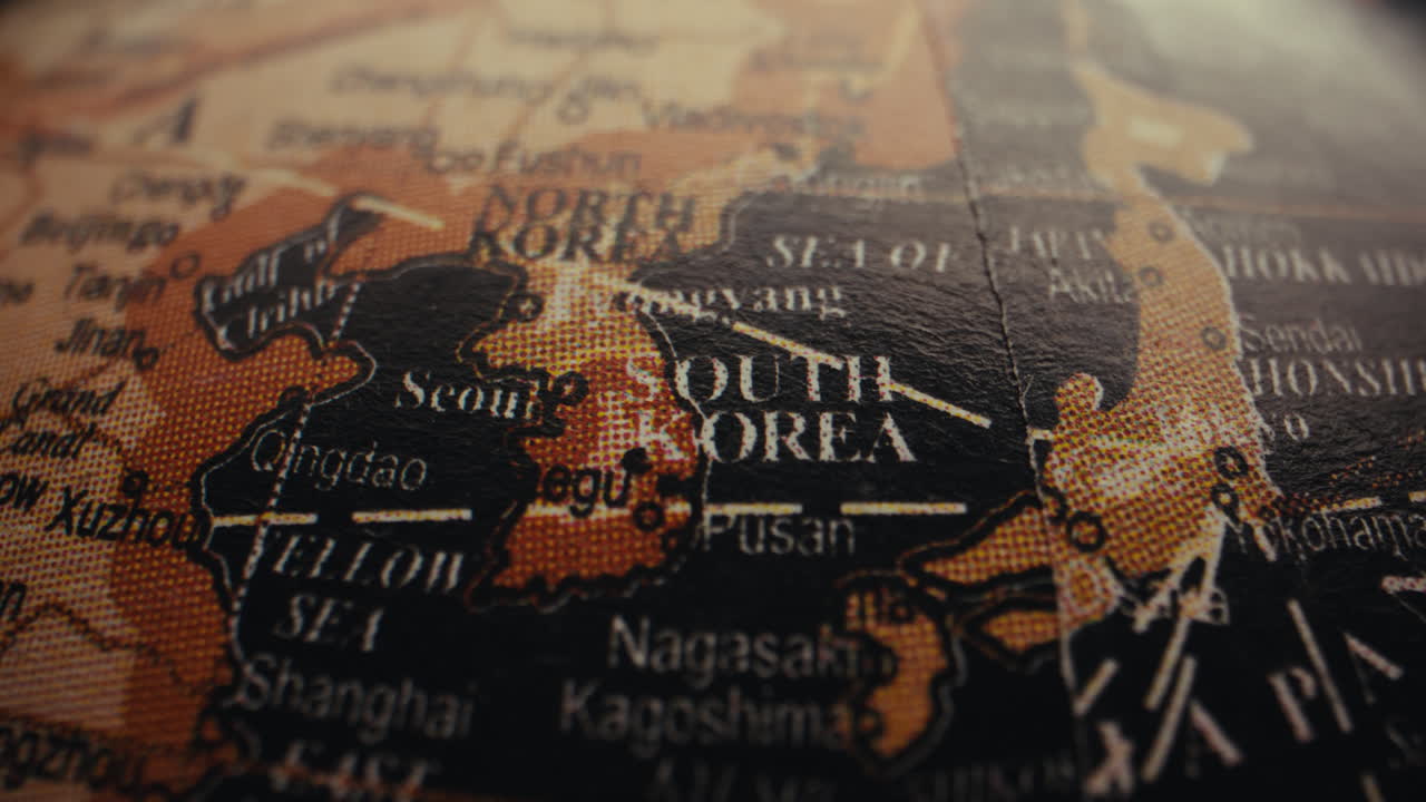 Close-up of a world globe focused on South Korea and surrounding areas