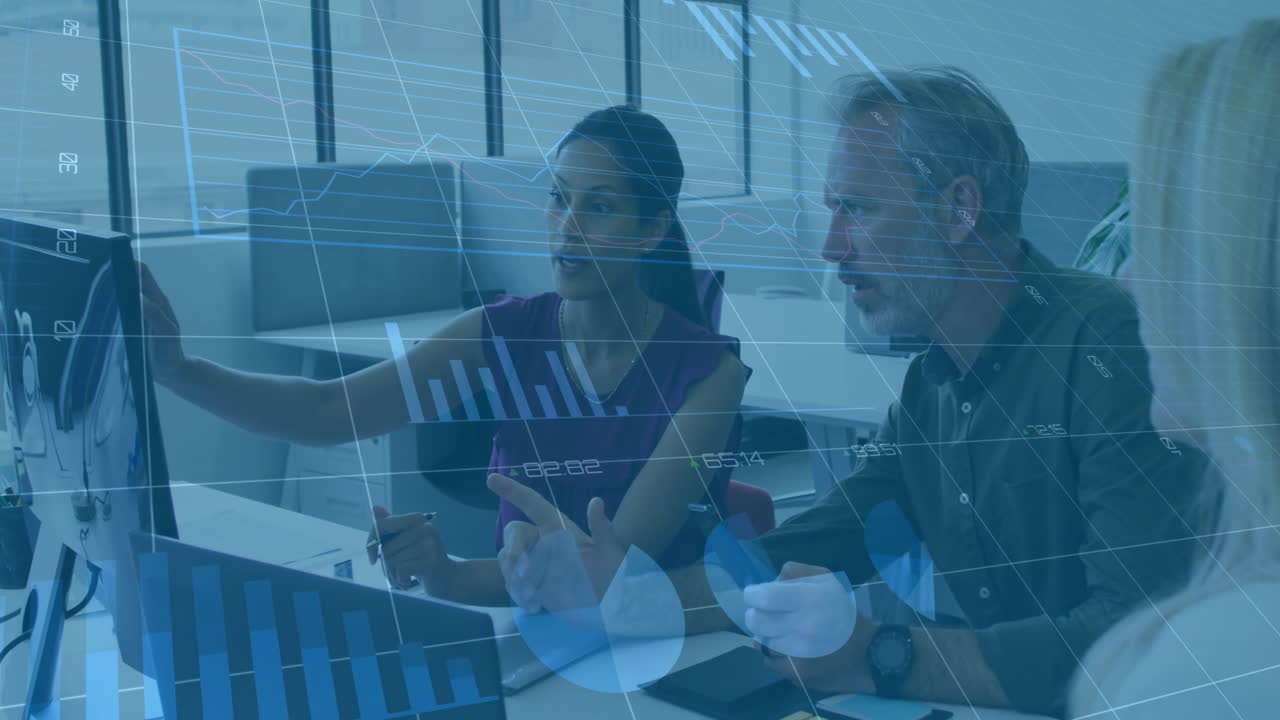 Analyzing data with digital graphs, business professionals collaborating in office