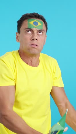 brazilian supporter angry with the decision of the referee