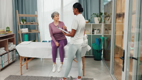 Patient,-physiotherapist-and-clipboard-in-clinic