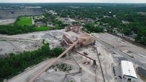 aerial view of a large stone quarry and processing plant