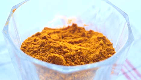 turmeric powder in a glass bowl