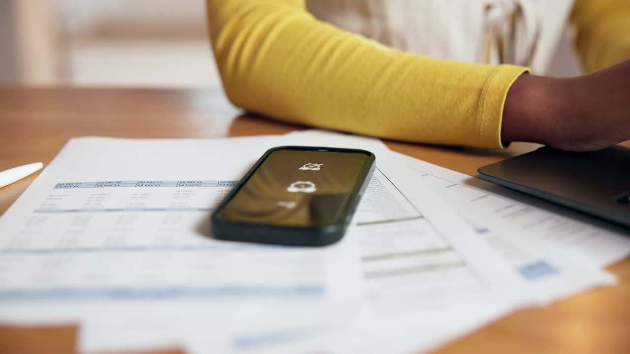 Financial planning with smartphone and receipts