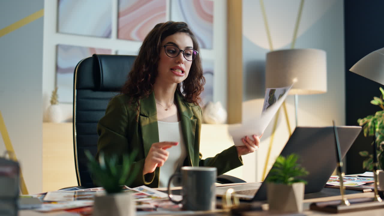 Woman ceo speaking video chat discussing work close up. Dissatisfaction results