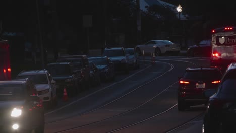 Traffic,-Cars,-Headlights-along-Chester-Avenue,-West-Philadelphia,-twilight