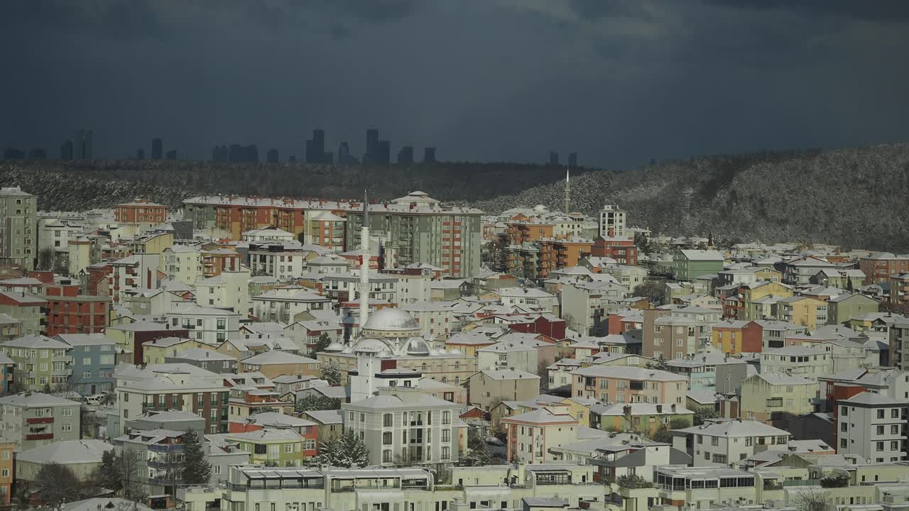 Snowy Cityscape with Buildings and Mosques