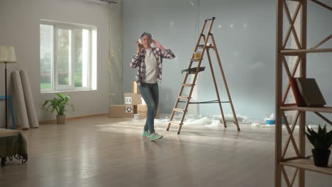 young woman in big wireless white headphones enjoy.mov | adult, apartment, box, bucket