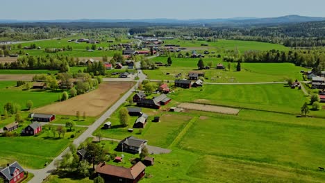 rural landscape of appelbo village amidst the lush forest in dalarna county, sweden