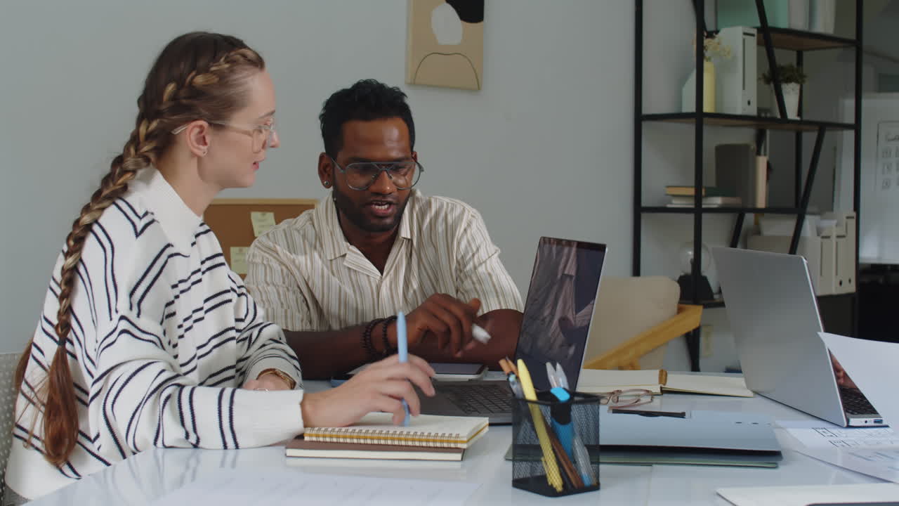 Team of Multi-ethnic Developers Discussing App Launch