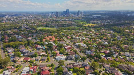 drone of houses and horizon view of the city in the distance sydney, australia