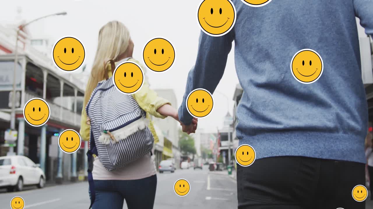 행복한 백인 커플이  ⁇ 고 손을 잡고 떠다니는 디지털 이모지 아이콘의 애니메이션